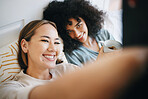 Love, selfie and lesbian couple relaxing on bed for bonding together in the morning on weekend. Smile, happy and young interracial lgbtq women taking a picture in bedroom of modern apartment or home.