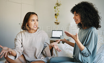 Buy stock photo Lgbtq, women and couple argue in bedroom of home with conflict, crisis or problem in relationship. Lesbian, partner and girl on bed with stress, anxiety and depressed for argument, divorce or fear
