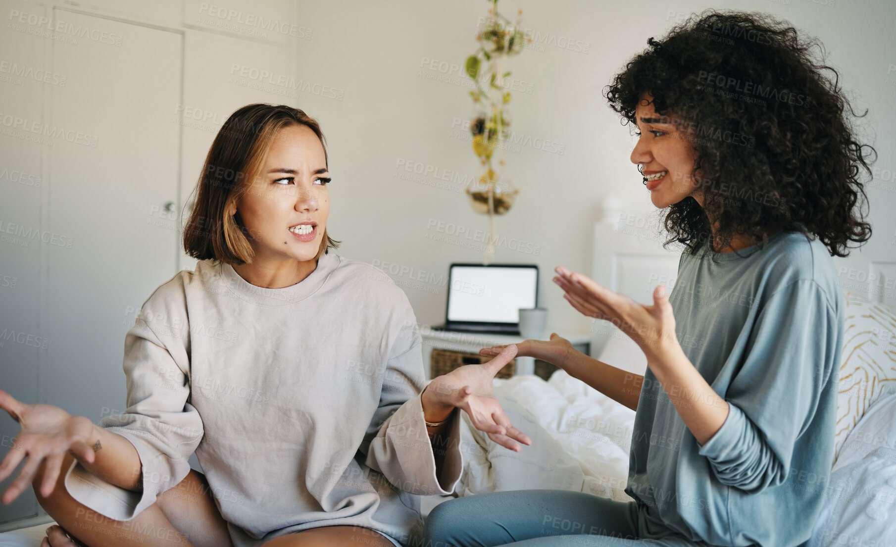 Buy stock photo Lgbtq, women and couple argue in bedroom of home with conflict, crisis or problem in relationship. Lesbian, partner and girl on bed with stress, anxiety and depressed for argument, divorce or fear