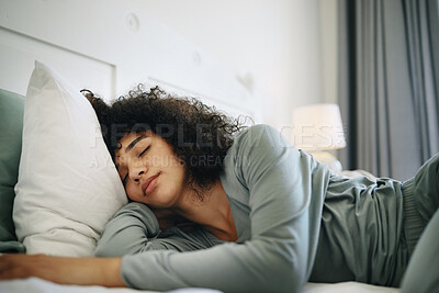 Buy stock photo Woman, Tired and sleeping on bed in bedroom with fatigue and burnout, dream and relax for stress relief. Exhausted, person and girl in house or home lying on pillow in apartment for wellness and calm