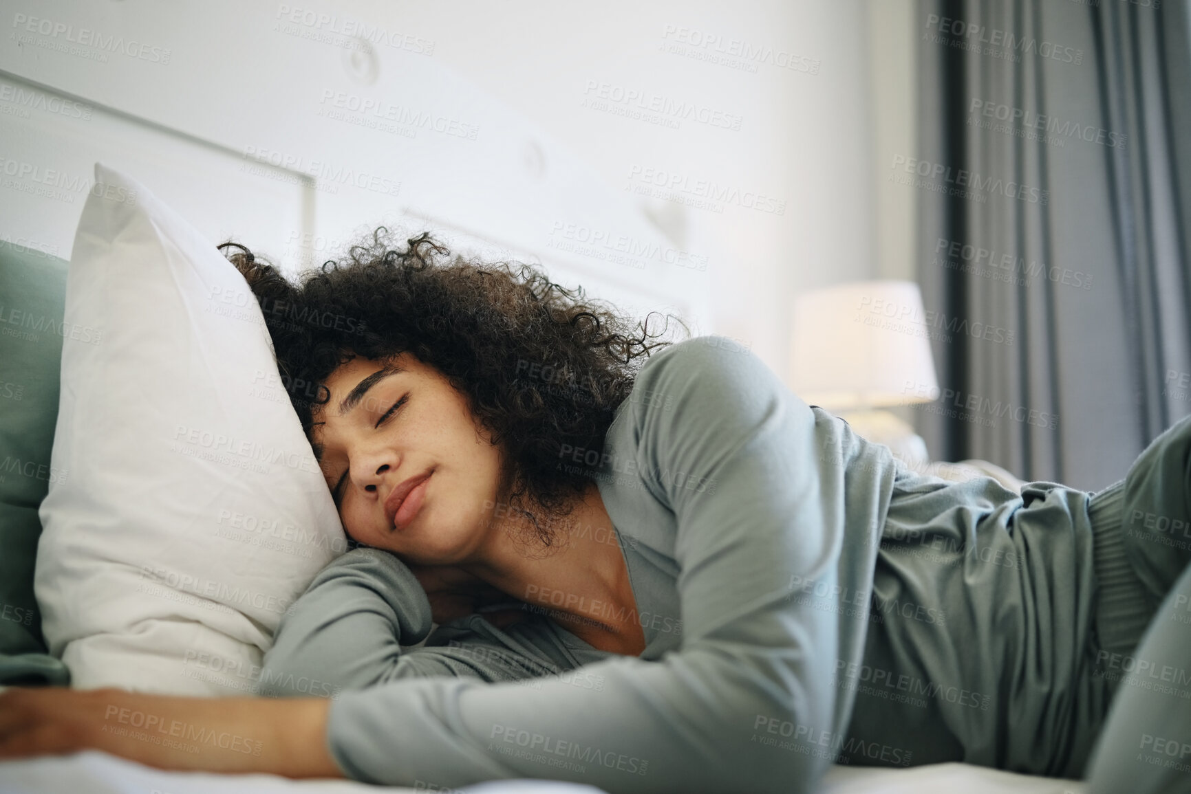 Buy stock photo Woman, Tired and sleeping on bed in bedroom with fatigue and burnout, dream and relax for stress relief. Exhausted, person and girl in house or home lying on pillow in apartment for wellness and calm