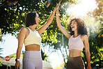 High five, yoga for fitness and woman friends outdoor together for success, support or motivation. Exercise, teamwork and partnership with young people in celebration as a winner pair for wellness