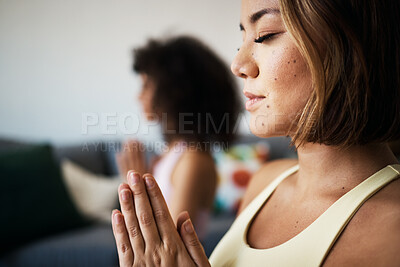 Buy stock photo Women, fitness friends and meditation with prayer for mindfulness, wellness and peace of mind at home. Yoga, spiritual and calm in lounge with healing and zen, namaste with exercise and self care