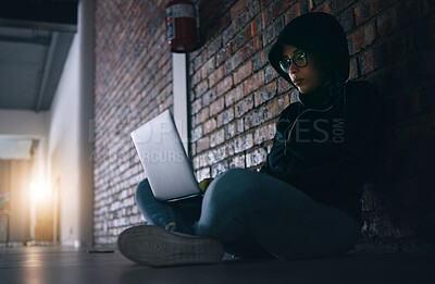 Buy stock photo Hacker, woman in dark room with laptop and programming, phishing and cyber crime with database or server. Cybersecurity, information technology and criminal with pc, ransomware and firewall breach