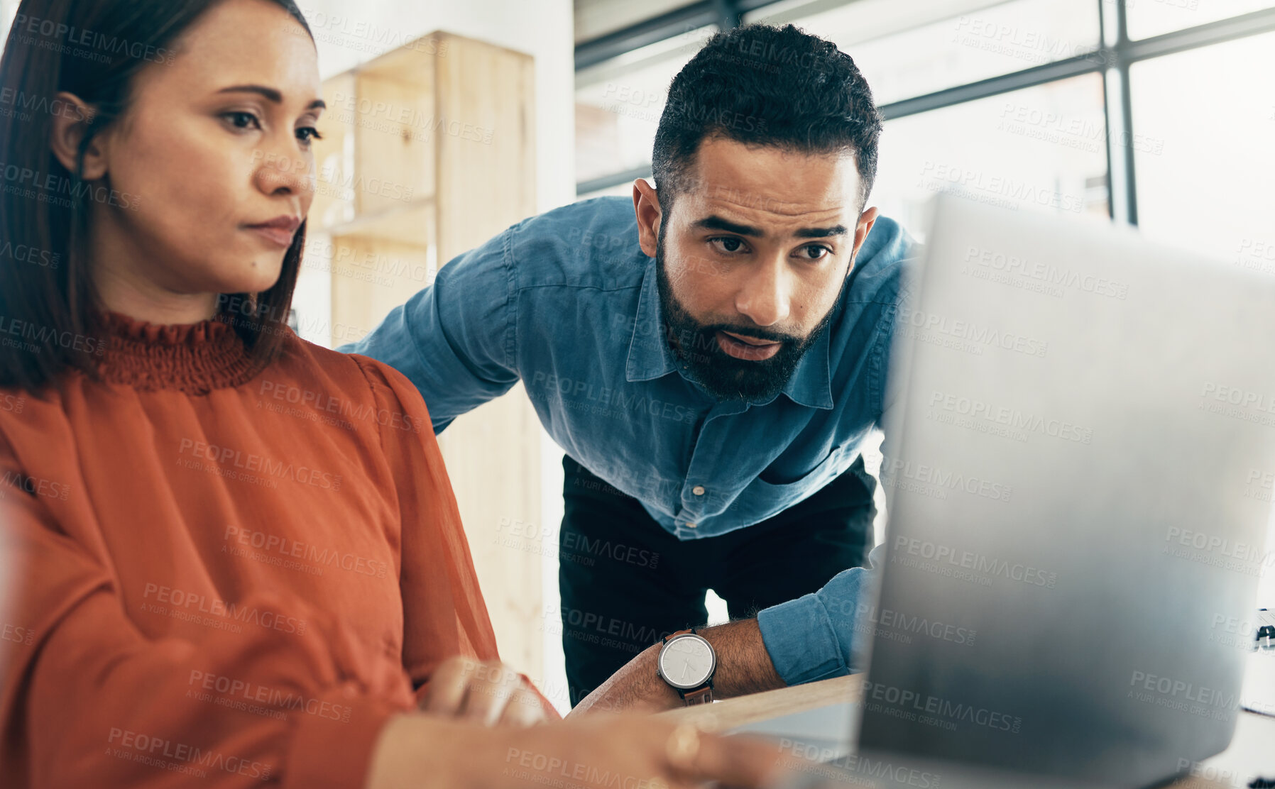 Buy stock photo Creative people, laptop and planning on team project, schedule or strategy together at office. Man and woman employee working on computer for brainstorming, teamwork or ideas in startup at workplace