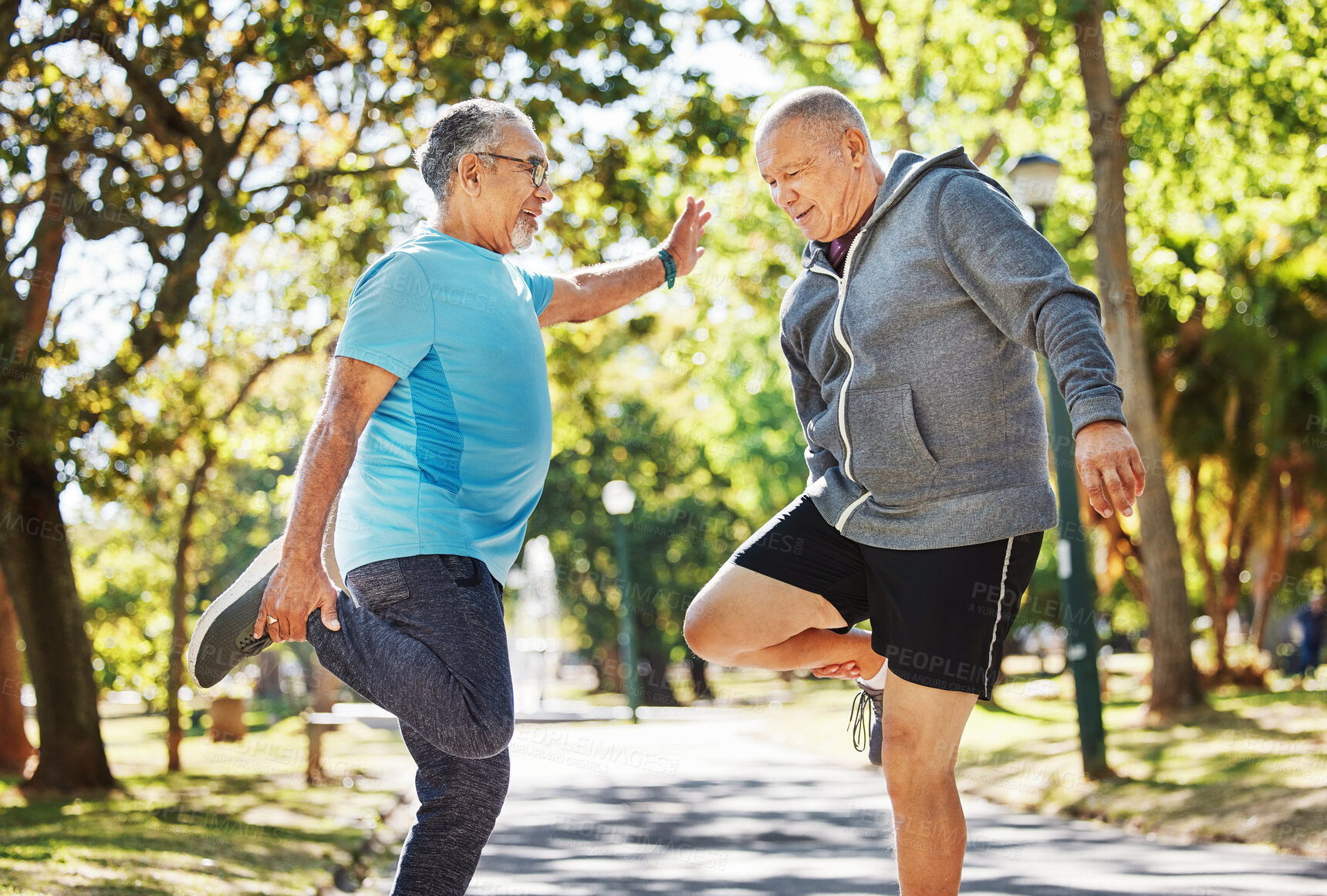 Buy stock photo Senior man, friends and stretching in park for running, exercise or outdoor training together in nature. Mature people in body warm up, leg stretch or preparation for cardio workout or team fitness