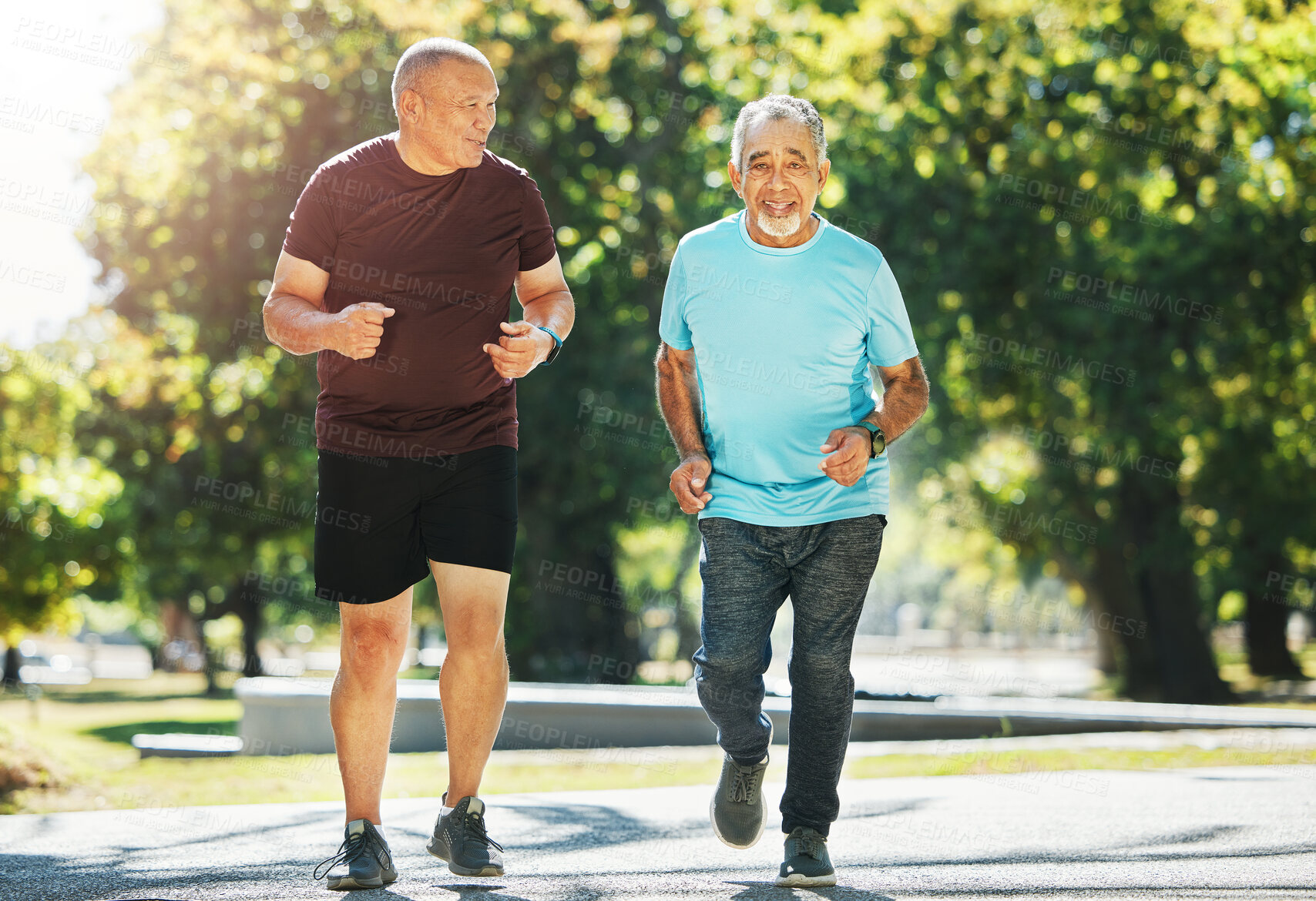 Buy stock photo Elderly, men and running for fitness in road of city for wellness, exercise or workout outdoor with smile. Senior, people and training together in nature or park for health, adventure and happiness