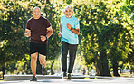 Elderly, men and running for fitness in road of city for wellness, exercise or workout outdoor with smile. Senior, people and training together in nature or park for health, adventure and happiness