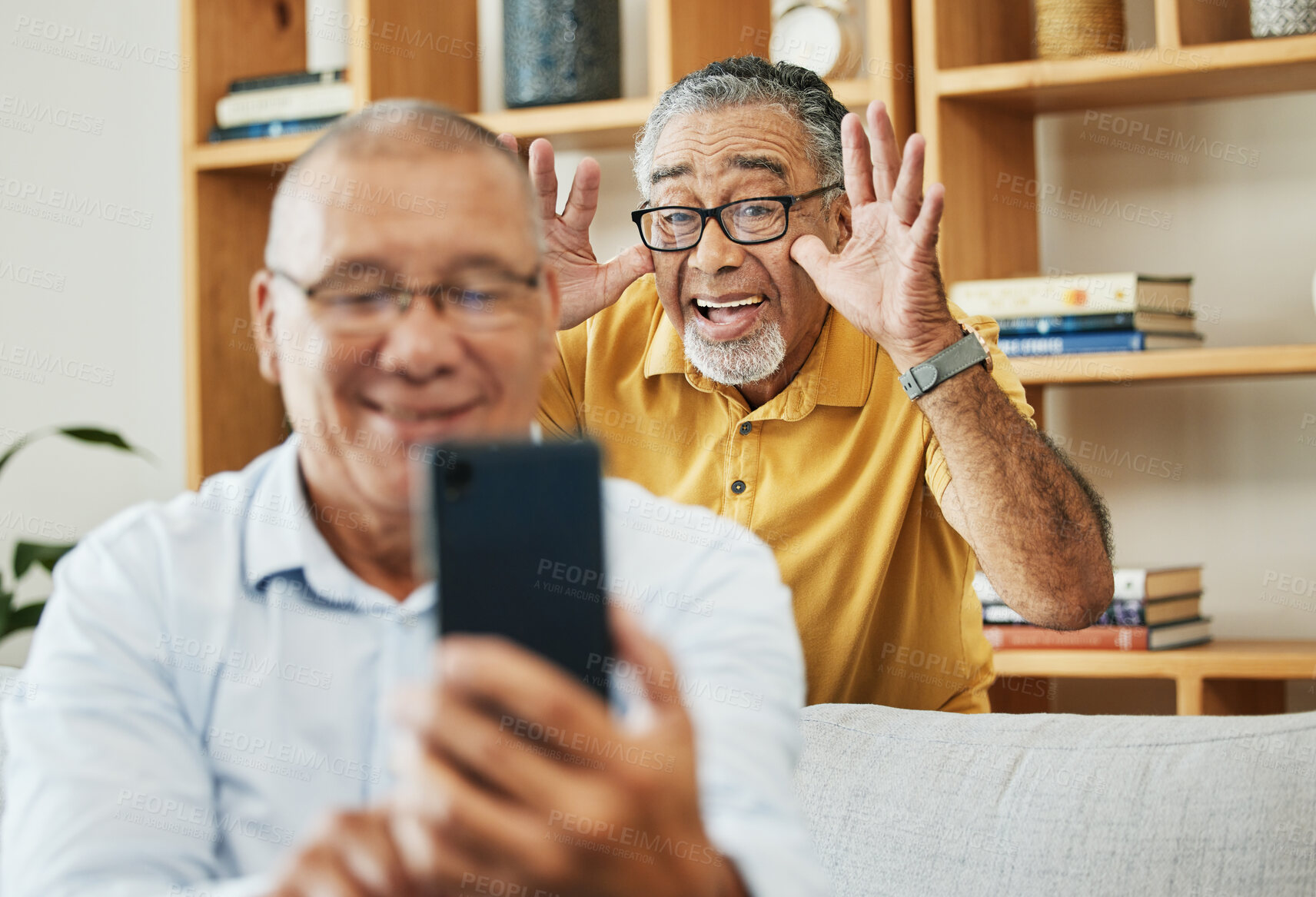 Buy stock photo Funny, selfie and men in a house as friends in retirement for relax, comedy and internet. Happy, together and senior or elderly people with a phone for a photo or video call with a comic gesture