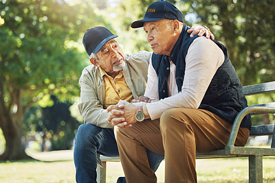 Buy stock photo Elderly men, park and comfort with friends, nature and communication with support in retirement. Empathy, closeup and senior people in conversation with trust, together and care on bench in summer