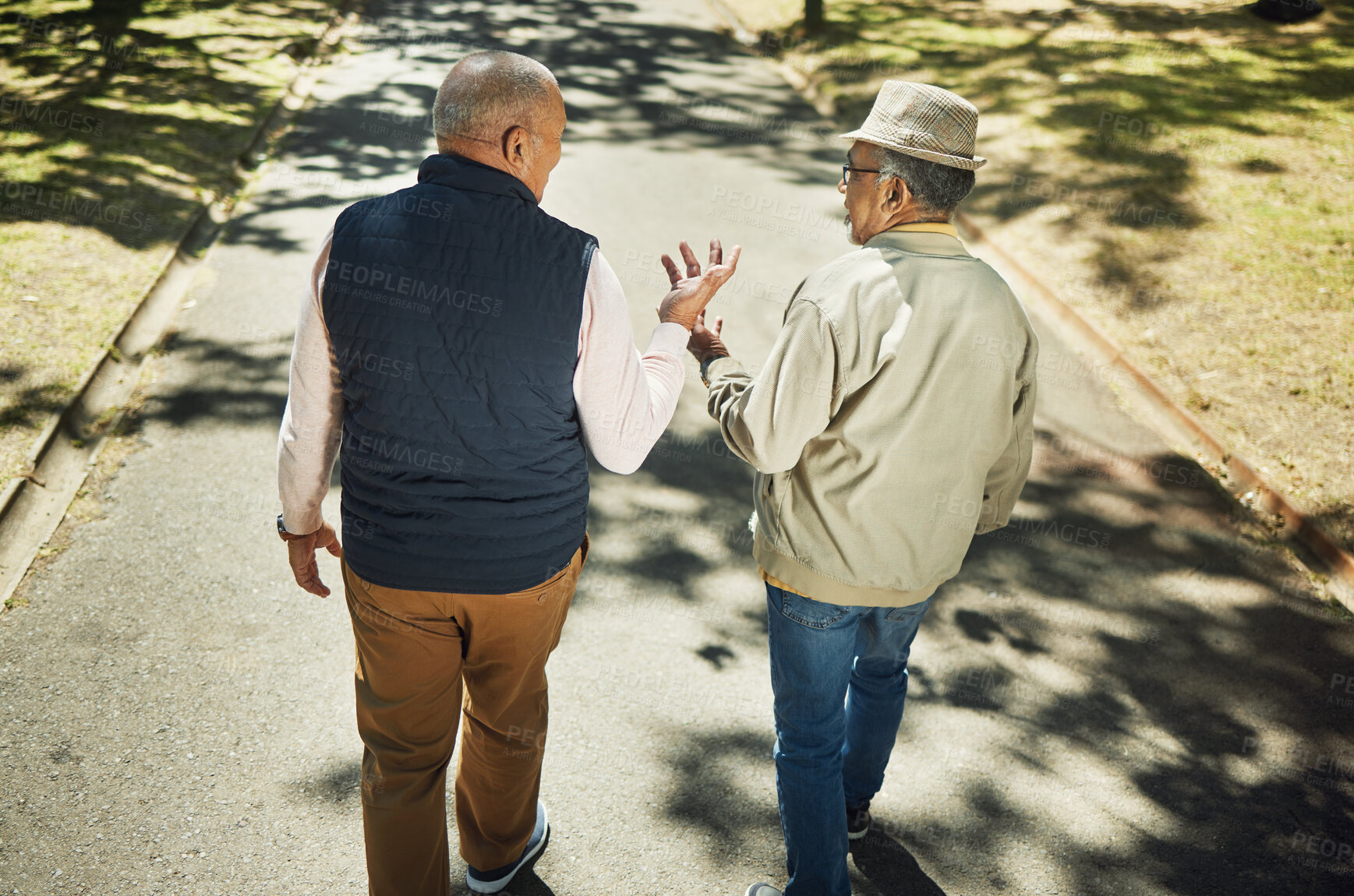 Buy stock photo Senior, friends walking and talking in park, nature and outdoor in retirement with support and communication. Elderly, men and above people on sidewalk in Chicago with conversation and community