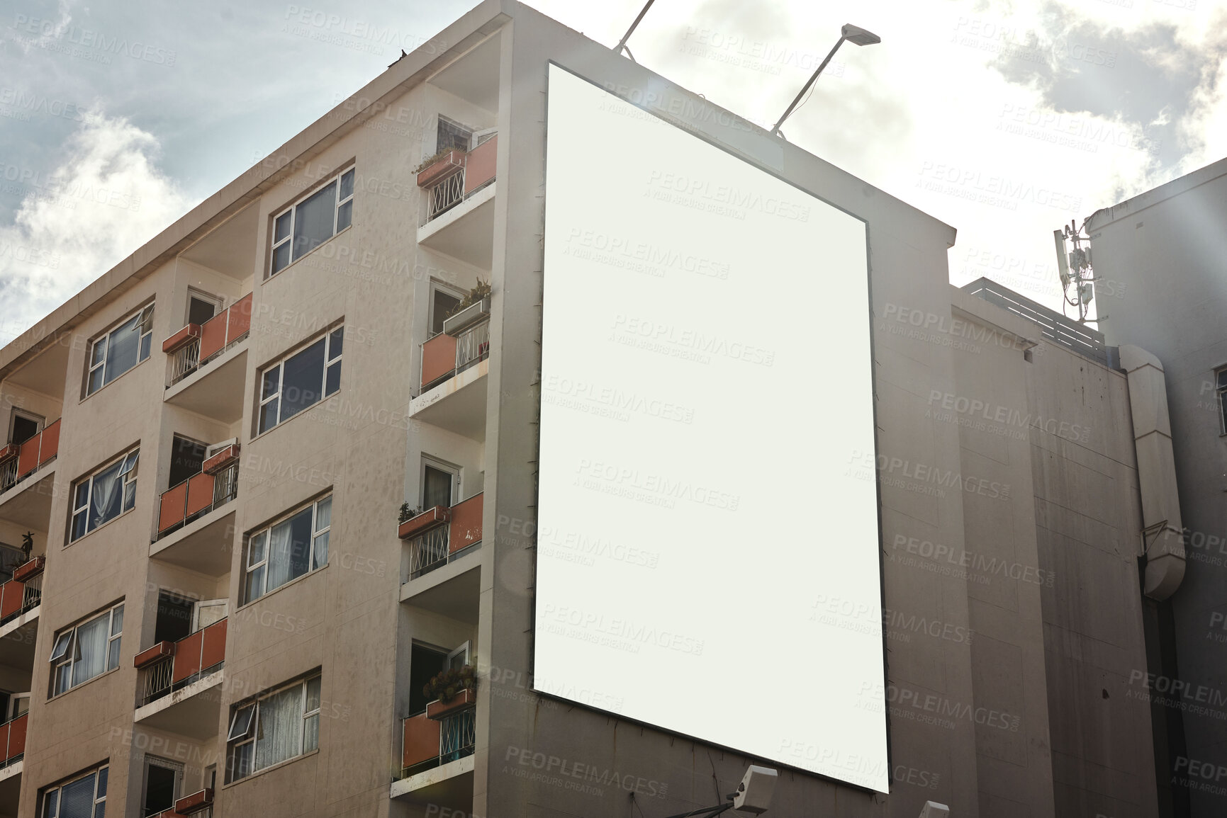 Buy stock photo Apartment building, mockup space and advertising billboard, commercial housing and real estate in city. Empty poster for property marketing, branding and communication with announcement in urban area