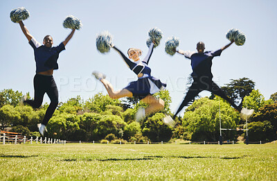 Buy stock photo Cheerleader team portrait, blur and jump for performance on field outdoor in training, celebration or exercise. Happy, cheerleading group and energy for support at event, sport competition and dance