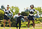 Cheerleader team, blur and people dancing in performance on field outdoor for exercise, training and healthy body. Smile, cheer group and support at event, sports competition and workout with energy
