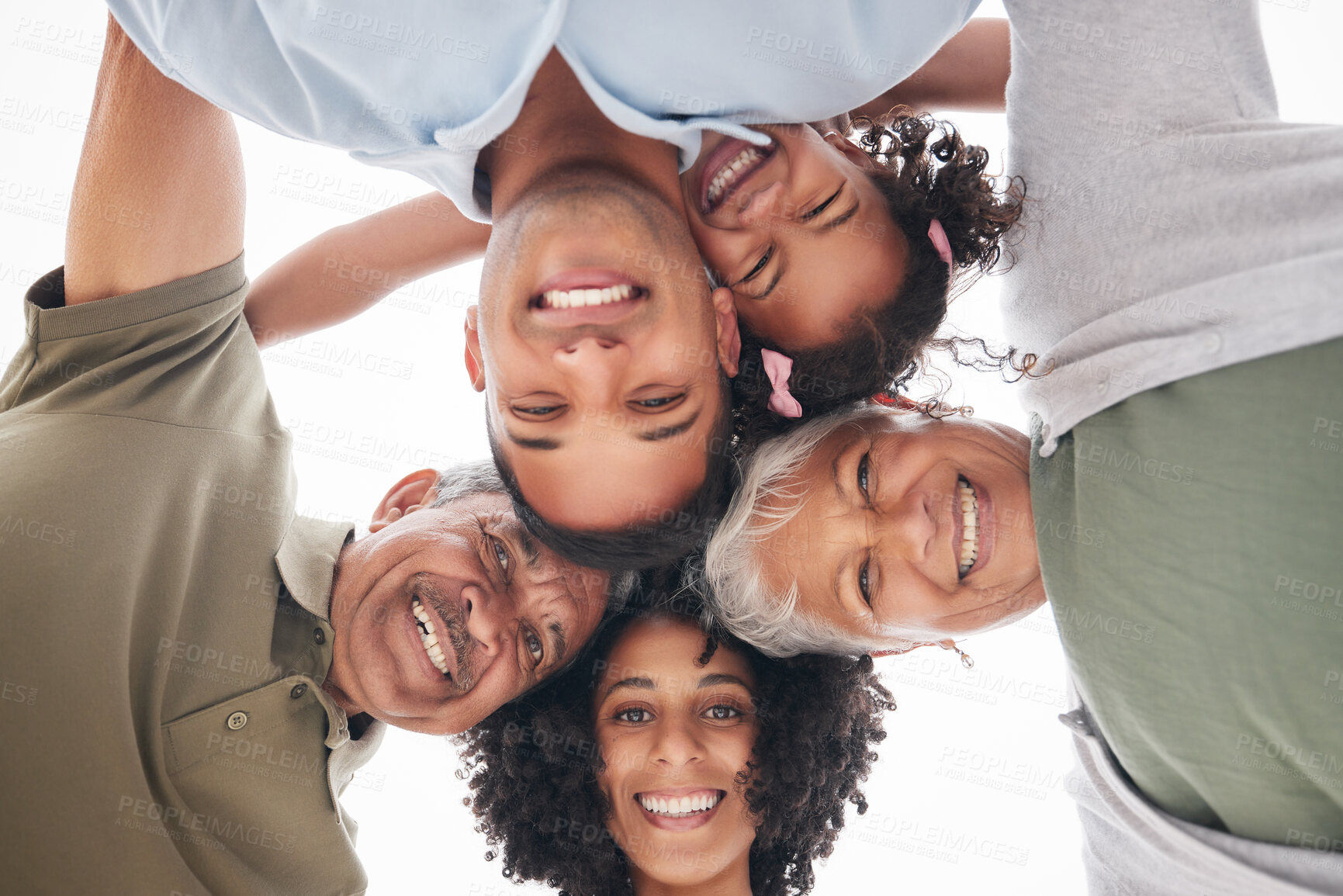 Buy stock photo Happy family, circle and portrait from below with love, care and bonding outdoor together. Face, smile and girl child with parents, grandparents or hug outside with freedom, fun and low angle support