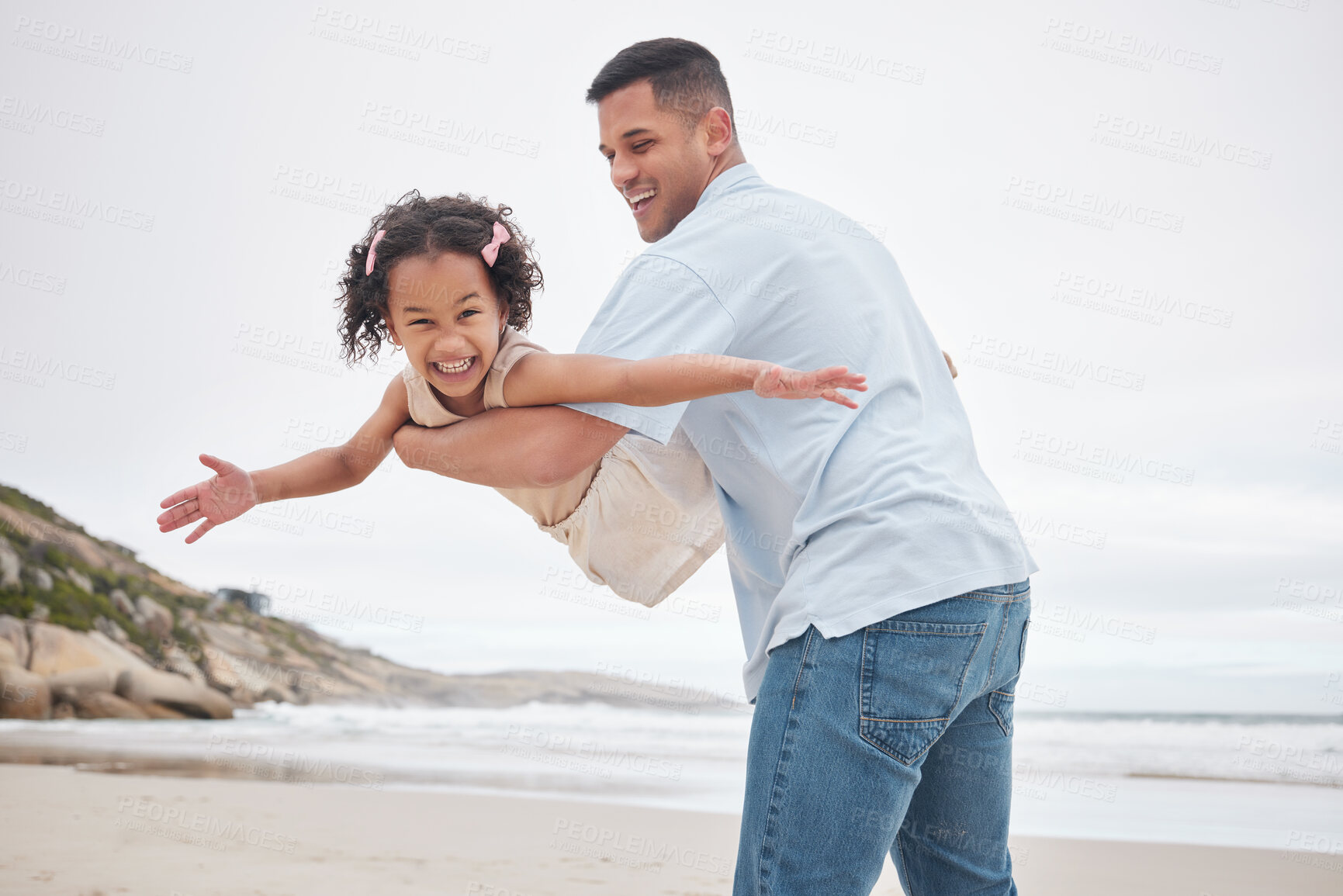 Buy stock photo Airplane, beach and girl child with father in nature happy, bond and having fun together. Flying, freedom and face and kid with parent at the ocean with love, support and games, care or trust outdoor