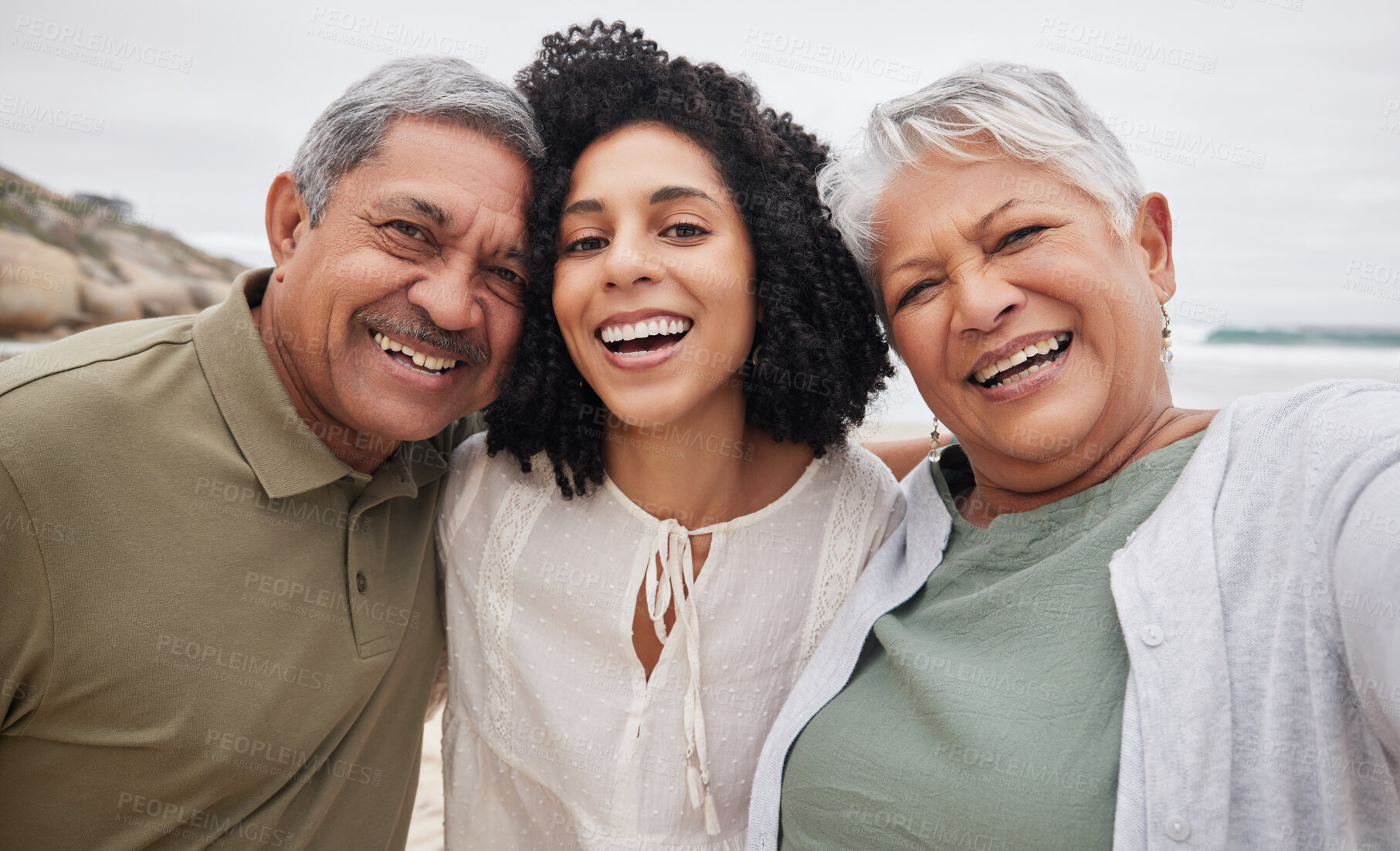 Buy stock photo Portrait, funny woman and senior parents at beach on holiday, vacation or travel outdoor. Face, daughter and elderly mother and father bonding together at ocean for family connection, smile and laugh