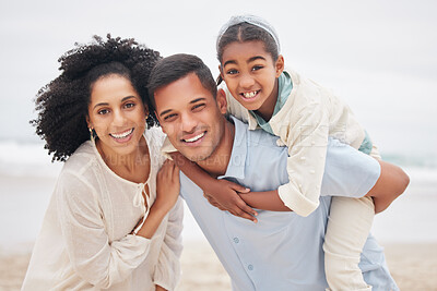 Buy stock photo Portrait, happy family and piggyback at the beach with freedom, fun and bonding in nature. Love, face and parents with girl child at the ocean for games, travel and vacation, holiday or trip at sea