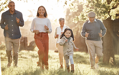 Buy stock photo Family, running and parents or grandparents with girl child in park for freedom, adventure or playing in summer. Love, men or women with fun on grass field or forest in sunshine for care or happiness