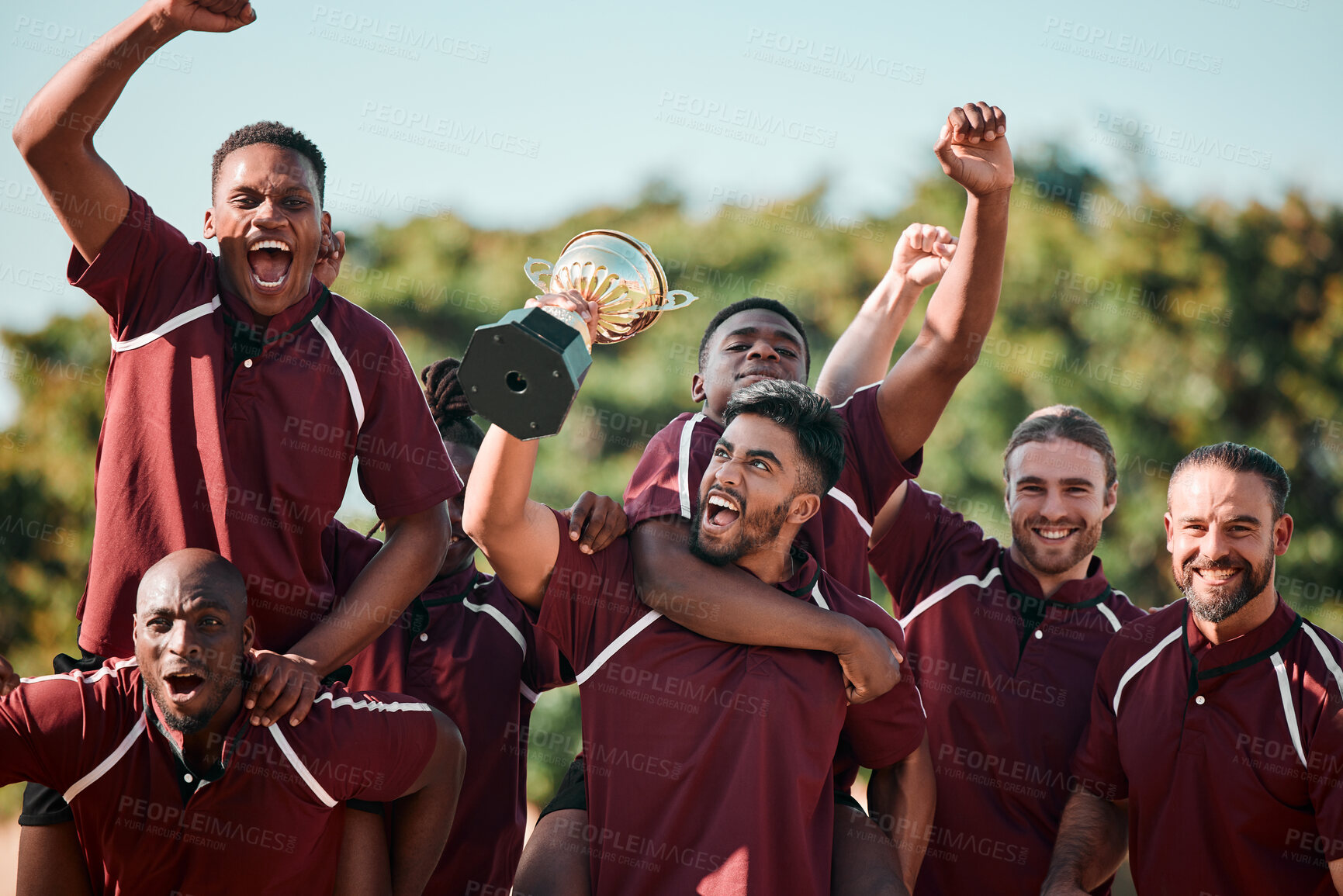 Buy stock photo Sports, winning and team on field for celebration, cheers and excited trophy at competition. Smile, men and teamwork in rugby, happy friends jump with praise, achievement and game success together.