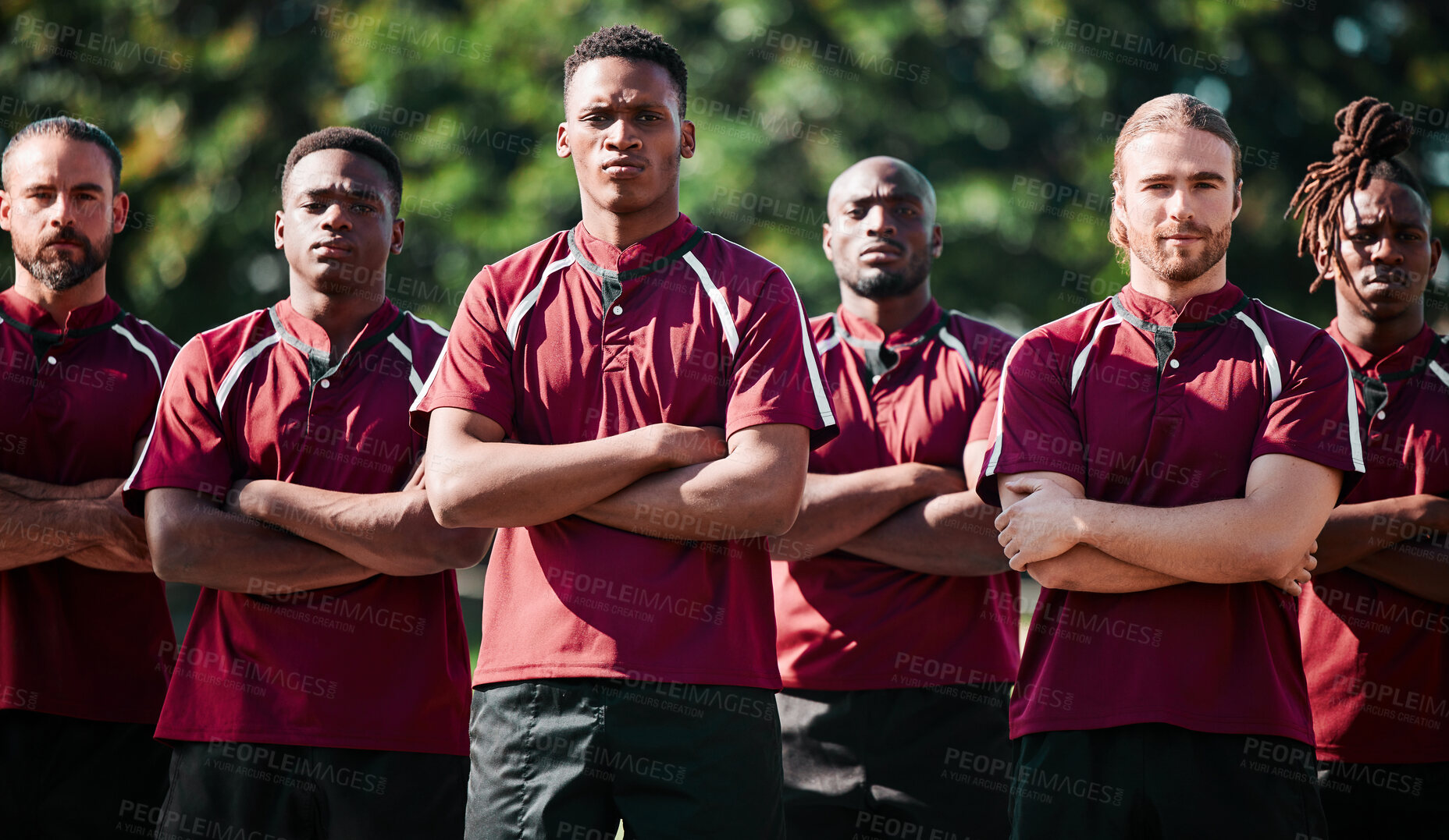 Buy stock photo Team, men and field for athlete in portrait with arms folded, united and determined with mindset to win. Diverse group, players and together with intense, rugby sports and face for victory in game