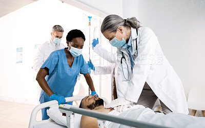 Buy stock photo CPR, emergency and doctor with patient for first aid, medical service and surgery in hospital. Healthcare, teamwork and person do chest compressions for injury, serious accident or wellness in clinic