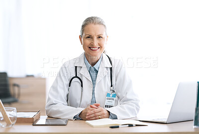 Buy stock photo Smile, office and portrait of woman doctor at medical administration desk for medicine information and working. Confident, healthcare and happy professional worker at surgeon table for insurance