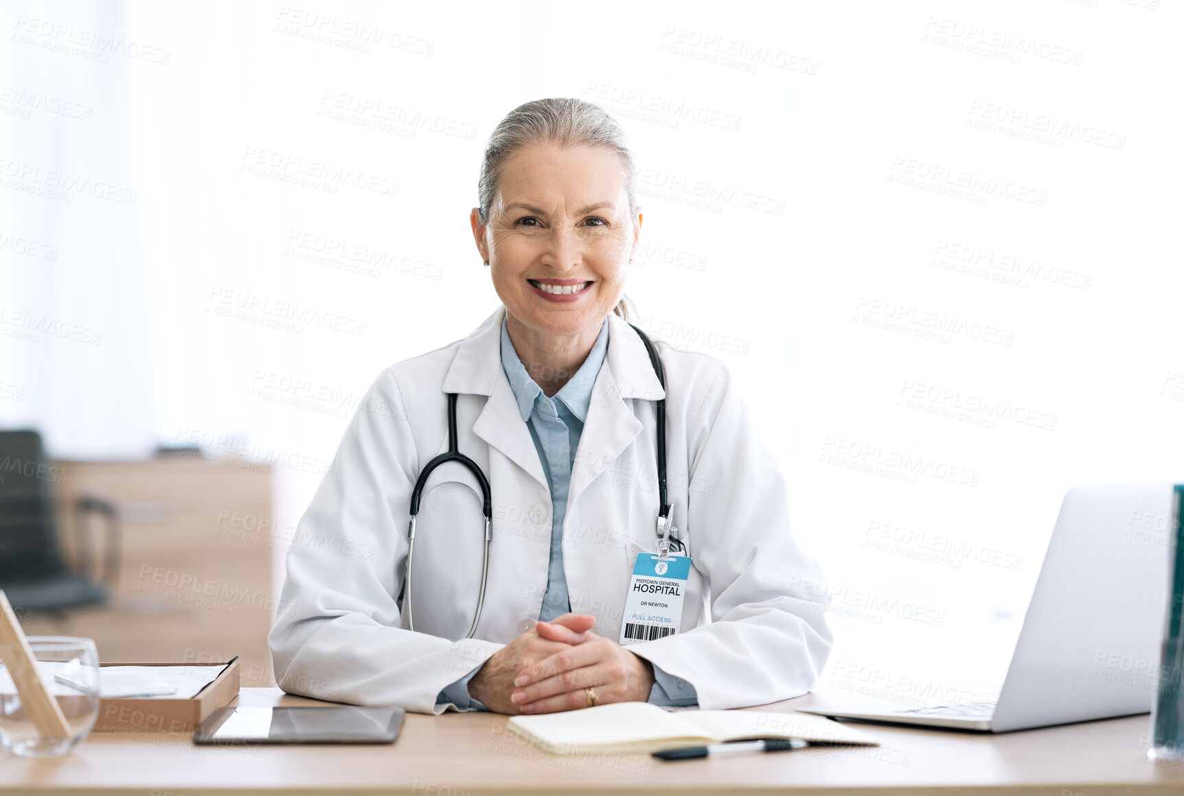 Buy stock photo Smile, office and portrait of woman doctor at medical administration desk for medicine information and working. Confident, healthcare and happy professional worker at surgeon table for insurance