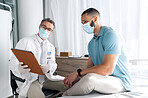 Doctor, patient and tablet with face mask in healthcare consultation for charts, test results or online advice. Medical professional and man on digital tech for hospital or clinic support with virus