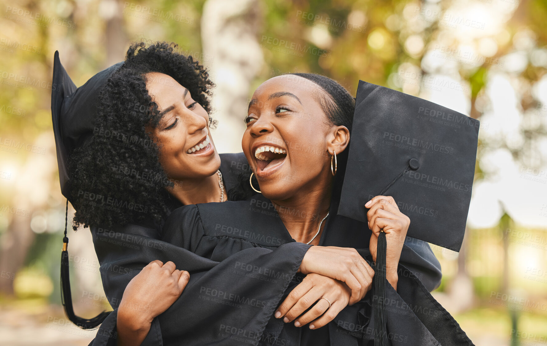 Buy stock photo Celebration, graduation and women outdoor, hug and happiness with achievement, degree and university. People, students and friends embrace, education and outside with excellence, diploma and support