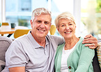 Senior, portrait or happy couple in home with love on sofa to bond or hug in a marriage commitment together. Smile, face or mature people in retirement with care or support in living room to relax 