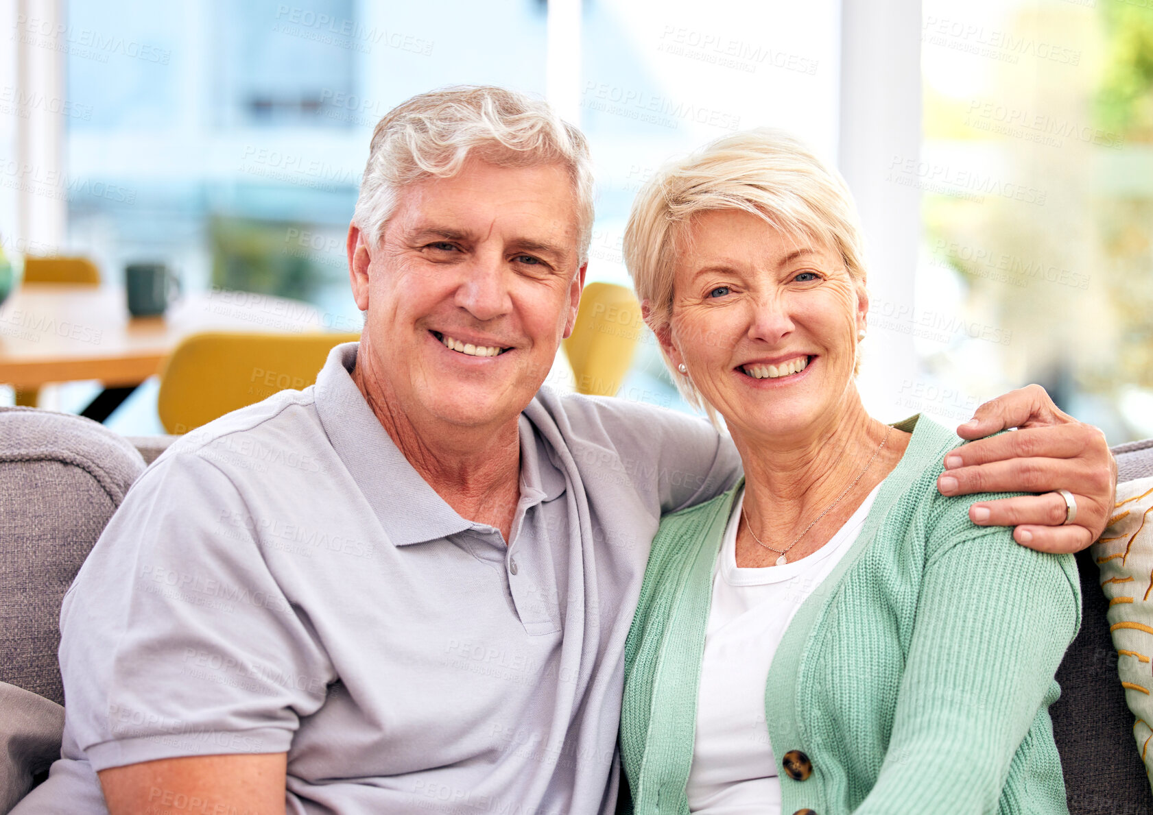 Buy stock photo Senior, portrait or happy couple in home with love on sofa to bond or hug in a marriage commitment together. Smile, face or mature people in retirement with care or support in living room to relax 