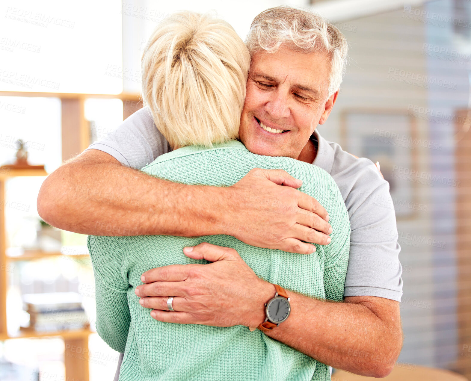 Buy stock photo Home, love or senior couple hug in for romance, care or bonding together in a healthy connection. Happy man, mature woman or romantic people embrace to celebrate marriage anniversary with a smile