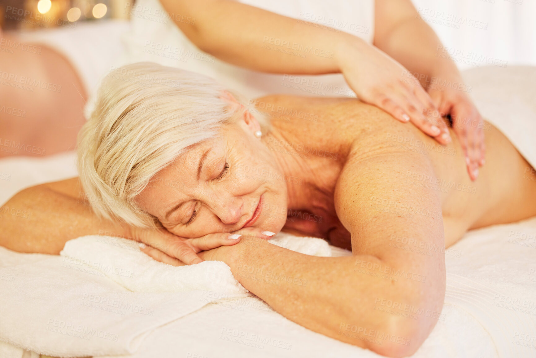 Buy stock photo Relax, back massage and senior woman sleeping at a spa for health, wellness and skincare treatment. Calm, beauty and closeup of elderly female person with  body self care routine at a natural salon.