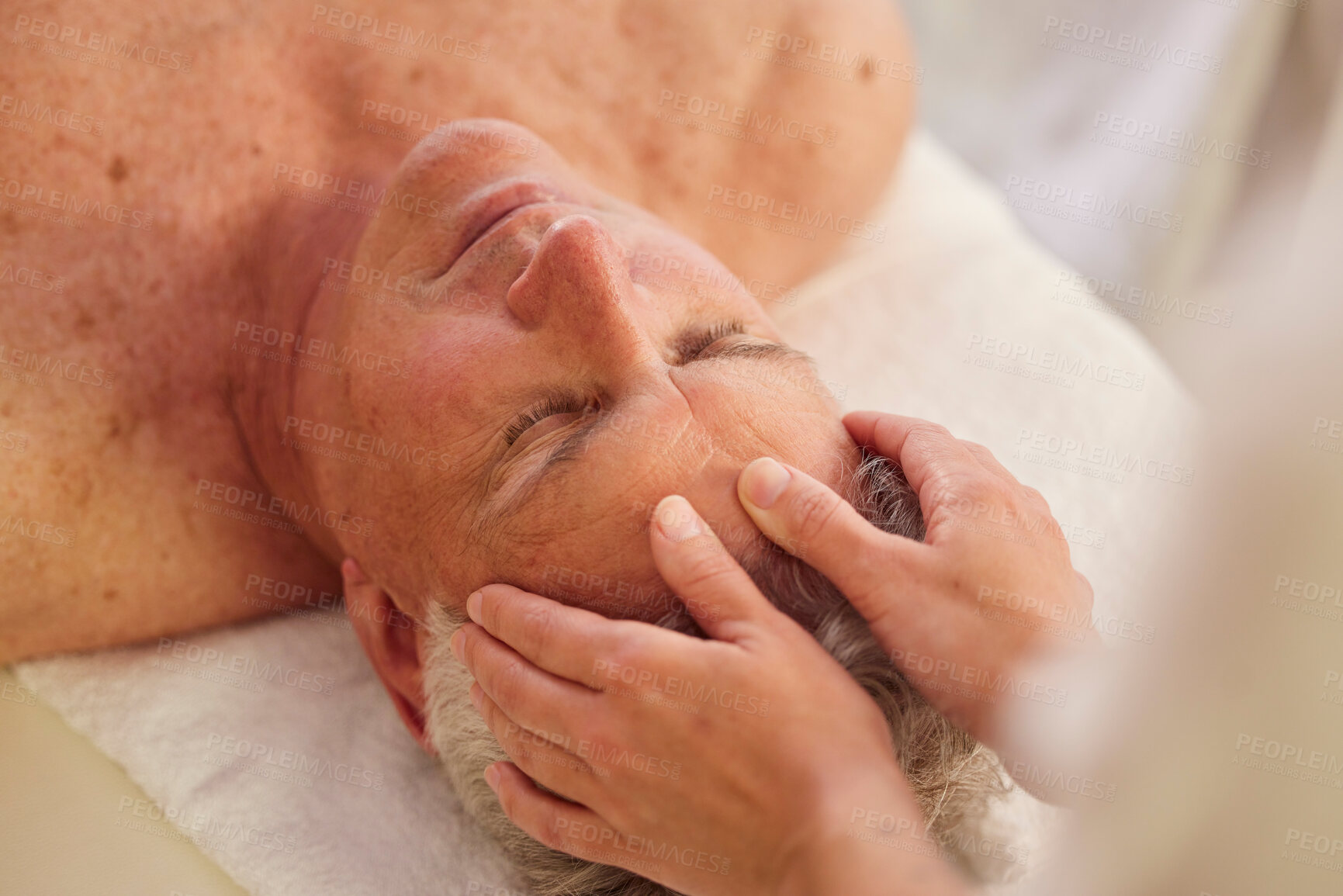 Buy stock photo Relax, head massage and senior man at a spa for luxury, self care and muscle healing treatment. Health, wellness and elderly male person on a retirement retreat for face therapy at a natural salon.