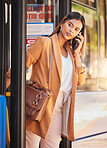 Business, woman or phone call at bus stop for travel or location with public transport for commute in urban city. Professional, corporate or person with smartphone and chat, talking or transportation