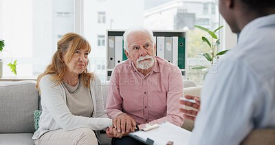 Counseling, support and senior couple with therapist in consultation for help, talk or crisis guidance. Therapy, depression and old people holding hands consulting marriage or mental health expert