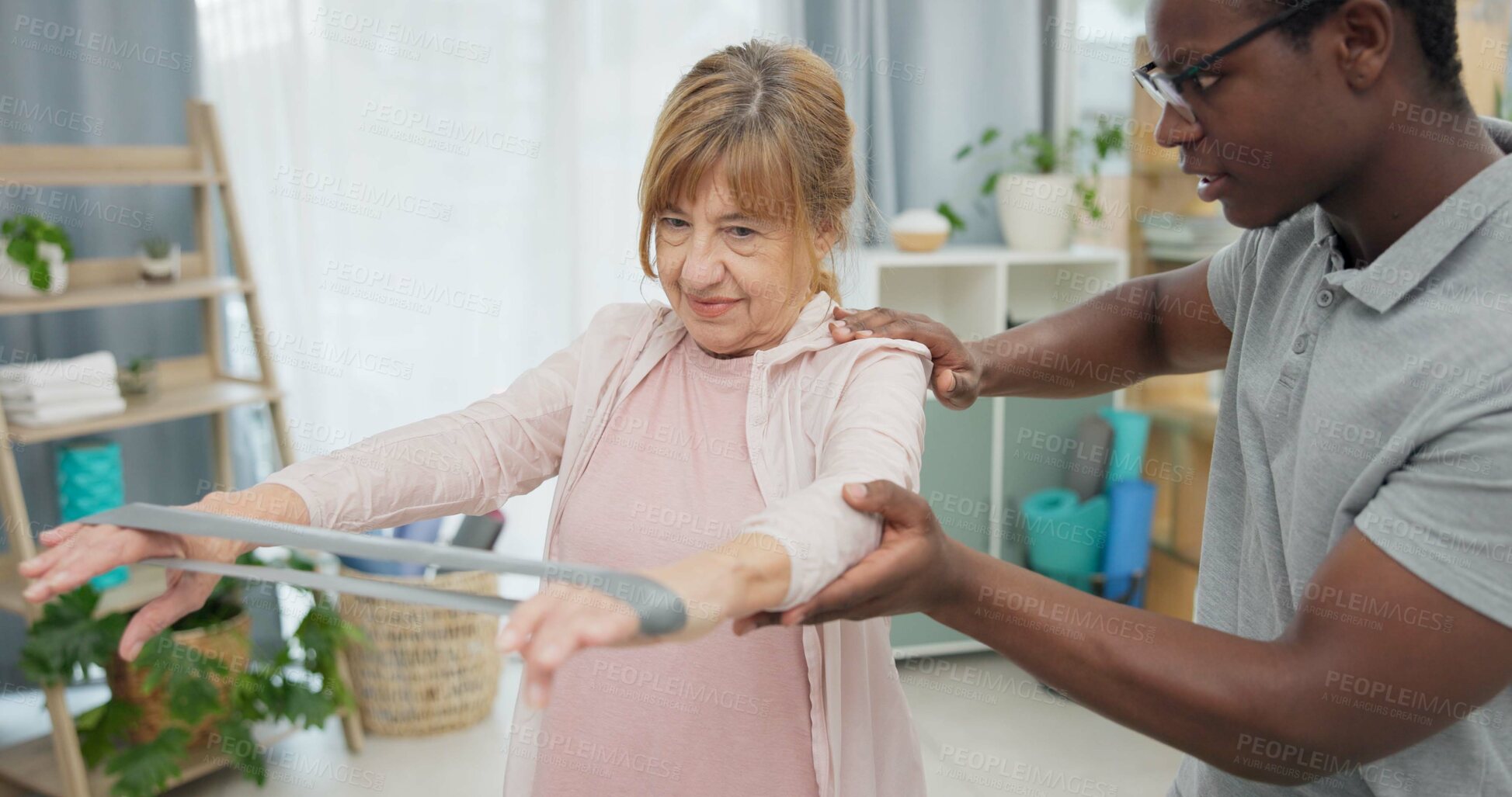 Buy stock photo Physiotherapy, arms resistance band and old woman for rehabilitation, recovery or help for motion training. Physical therapy, black man or physiotherapist stretching senior woman for mobility problem