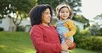 Family, kids and a mother with her adopted daughter in the garden of their foster home together. Love, smile and children with a stepmother holding her female child outdoor in the home backyard