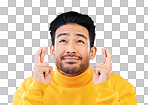 Hope, man with his fingers crossed for luck and against a blue b