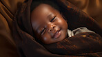 Closeup of sleeping newborn boy baby. Portrait of baby wrapped in blanket