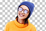Portrait of happy woman in winter fashion with glasses, beanie and smile isolated on blue background. Style, happiness and face of gen z girl on studio backdrop with warm clothing for cold weather.