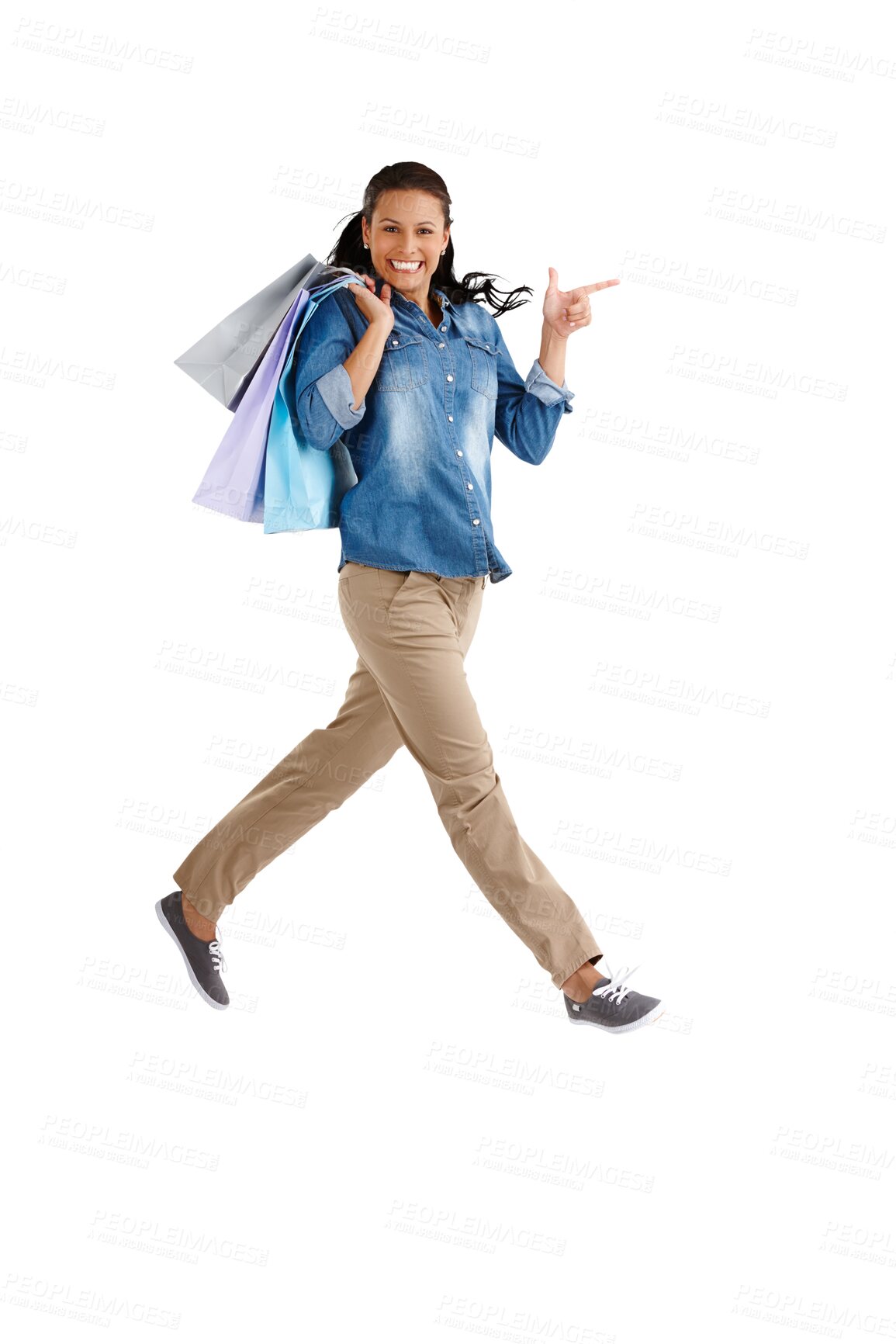 Buy stock photo Woman jump, winning and shopping bag for fashion sale, discount or retail celebration in air. Portrait, excited customer or winning pointing to deal and running isolated on transparent png background