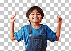 Adorable little boy looking cheerful wearing casual clothes and pointing his finger up against an orange copyspace  background. Little boy with an idea while having fun