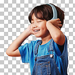 A cute little asian boy enjoying listening to music while wearing headphones against an orange copyspace background .Adorable Chinese kid feeling the magic of music