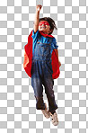 Adorable little asian boy wearing a mask and a cape while pretending to be a superhero against an orange studio background. Cute happy boy pretending to be a character for halloween