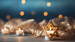 Close up of traditional Jewish items on table with bokeh in background.