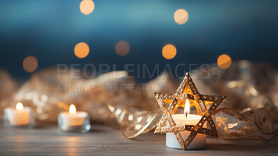 Close up of traditional Jewish items on table with bokeh in background.