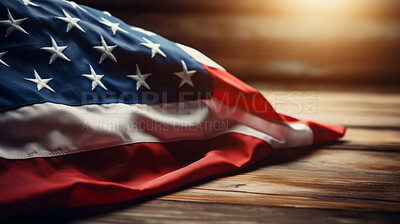 American flag on table with sun flare in background. Open space for copy. Memorial day concept