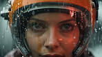 Female android wearing robotic helmet in pouring rain.